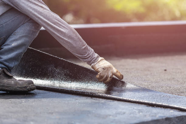 Professional Waterproofing technician working in Axis, AL